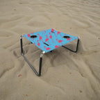Neso Beach Table - Lightweight, Portable and Foldable Table for Beach, Camping and Outdoor Adventures - Stable Surface - with Cup Holder for Drinks and Phone Pockets - Flamingos
