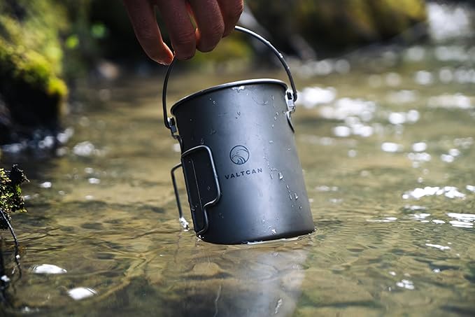 Valtcan 900ml Titanium Pot Boil Cook & Drink From One Pot, 134g Ultralight, Thicker Gauge Grade 1 Ti, Aligned Bail Handle, Nests 32oz Nalgene, Lid with Steam Holes, Campfire & Stove, Mesh Bag