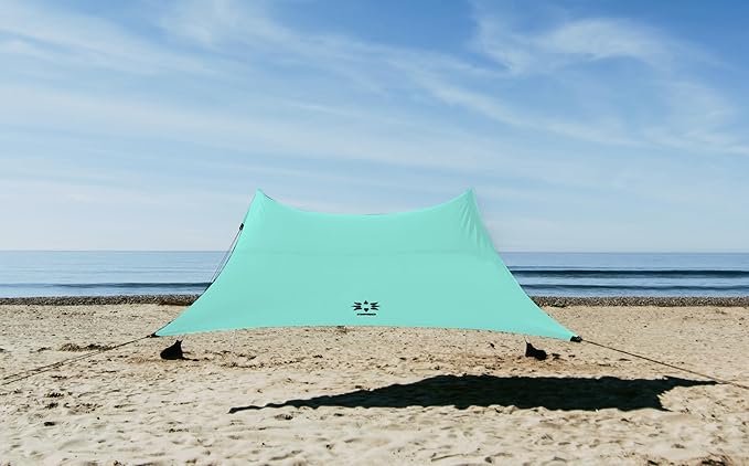 Neso Gigante Portable Beach Tent Sun Shelter - Lightweight Beach Shade Canopy - Easy Setup for Family Outings - Patented Reinforced Corners - UPF 50+ Sun Protection - 8ft Tall, 11 x 11ft - Seafoam