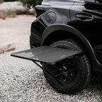Tire Table Medium Aluminum Camping Table for Camp, Travel, Tailgating, Overlanding and Outdoor Work | Easily Holds 50 Pounds | Installs Within Seconds | 29" x 23" x 1.5"