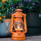 Feuerhand Outdoor Kerosene Fuel Lantern, German Made Weather Resistant Baby Special 276 Galvanized Hurricane Lamp for Camping or Patio, 10 Inches, Pastel Orange