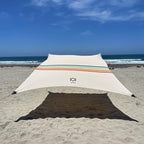 Neso Gigante Portable Beach Tent Sun Shelter - Lightweight Beach Shade Canopy - Easy Setup for Family Outings - Patented Reinforced Corners - UPF 50+ Sun Protection - 8ft Tall, 11 x 11ft - Rainbow