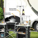 Outsunny Camping Kitchen Table, Portable Folding Camp Kitchen, Aluminum Cook Station with 3 Fabric Cupboards, Windshield, Carrying Bag for BBQ, RV, Picnic, Black