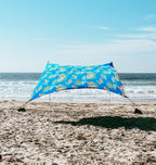 Neso Gigante Portable Beach Tent Sun Shelter - Lightweight Beach Shade Canopy - Easy Setup for Family Outings - Patented Reinforced Corners - UPF 50+ - 8ft Tall, 11 x 11ft - Tropical Floral