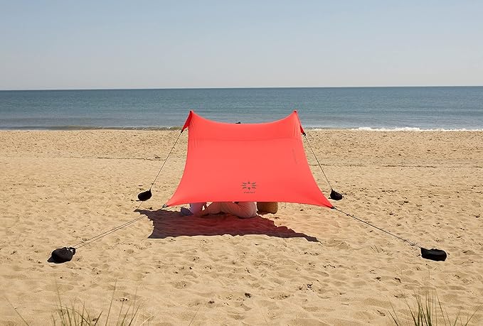 Neso Portable Beach Tent Sun Shelter with Sand Anchor - Lightweight Beach Shade Canopy - Easy Setup for Family Outings - Patented Reinforced Corners - UPF 50+ Sun Protection - 7 x 7ft - Lehua Red