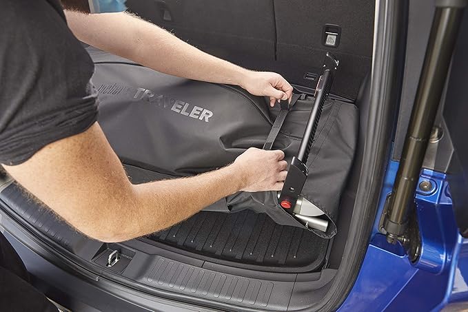 Weber Traveler Cargo Protector Grill Cover, Black – Form‑Fitted Grease‑Resistant Cover with Tool Storage Pockets, Heavy-Duty & Water Resistant for Easy Transport