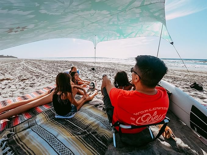 Neso Grande Portable Beach Tent Sun Shelter - Lightweight Beach Shade Canopy - Easy Setup for Family Outings - Patented Reinforced Corners - UPF 50+ Sun Protection - 7ft Tall, 9 x 9ft