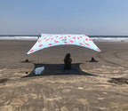 Neso Grande Portable Beach Tent Sun Shelter - Lightweight Beach Shade Canopy - Easy Setup for Family Outings - Patented Reinforced Corners - UPF 50+ Sun Protection - 7ft Tall, 9 x 9ft