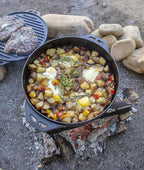 Lodge Cast Iron Cook-It-All Kit. Five-Piece Cast Iron Set includes a Reversible Grill/Griddle 14 Inch, 6.8 Quart Bottom/Wok, Two Heavy Duty Handles, and a Tips & Tricks Booklet.