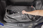 Weber Traveler Cargo Protector Grill Cover, Black – Form‑Fitted Grease‑Resistant Cover with Tool Storage Pockets, Heavy-Duty & Water Resistant for Easy Transport