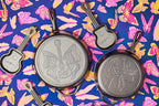 Lodge 10.25 Inch Dolly Parton Pre-Seasoned Cast Iron Stamped Skillet - Signature Teardrop Handle - Use in the Oven, on the Stove, on the Grill, or Over a Campfire, Black