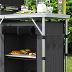 Outsunny Camping Kitchen Table, Portable Folding Camp Kitchen, Aluminum Cook Station with 3 Fabric Cupboards, Windshield, Carrying Bag for BBQ, RV, Picnic, Black