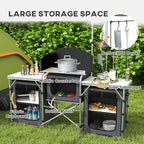 Outsunny Camping Kitchen Table, Portable Folding Camp Kitchen, Aluminum Cook Station with 3 Fabric Cupboards, Windshield, Carrying Bag for BBQ, RV, Picnic, Black